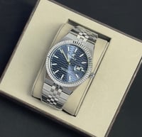 ساعة رجالية ريفولي بتصميم انيق بضمان سنه