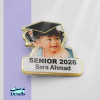 بروش تخرج بإطار ذهبي بفيونكة