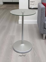 طاولة جانبية بزجاج وقاعدة ذهبية فاخرة