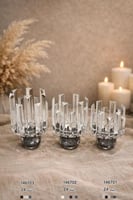 شمعدانات كريستال فاخرة بقاعدة داكنة