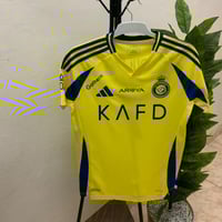 تيشيرت النصر الأصفر الجديد 2024 2025