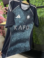 تيشيرت النصر الاحتياطي الثالث لموسم 2026 بشعار الن...