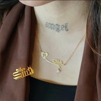 سلسال اسم مع حرف مطلي بالذهب