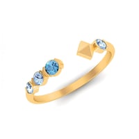 خاتم ستيتمنت ذهب عيار 18 قيراط مزين بالأحجار الملو...