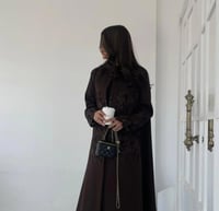 عباية شتوية تتزين بدانيتل