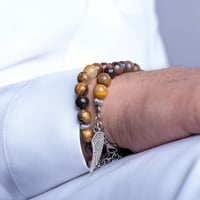 اسورة + سبحة عين النمر شكل جناح