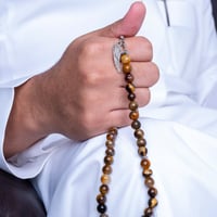 اسورة + سبحة عين النمر شكل جناح