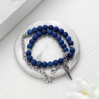 أسورة + سبحة حجر بركاني كحلي شكل جناح