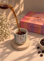 كوب مخطط اخضر