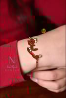 اسواره بالأسم زريكون ولون احمر