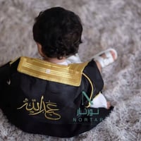 بشت اطفال مطرزه بالأسم