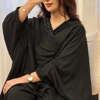 بشت نسائي مقلم خرز لون اسود