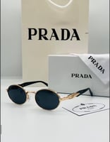 نظارة شمسية اطار ذهبي عدسات اسود بيضاوي