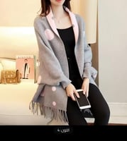 شال تريكو راقي من الصوف مزين بشرابة