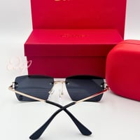 نظارة كارتير ذهبي بدون أطار بشعار بالعدسة السوداء