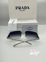 نظارة برادا عدسة مسحوبة أزرق مُدرج بذراع فضي