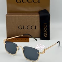 نظارة قوتشي بدون أطار ذهبي بعدسة سوداء