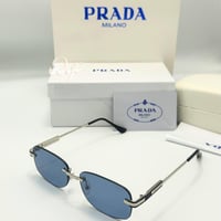 نظارة برادا فضي بدون أطار بعدسة زرقاء