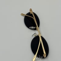 نظارة فيندي ببيضاوية ذهبي عدسة سوداء