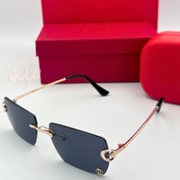 نظارة كارتير ذهبي بدون أطار بشعار بالعدسة السوداء