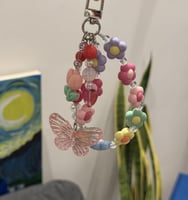 ميدالية شنط ورديه