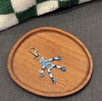 تعليقة رجل ألي ازرق