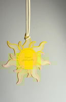 تعليقة وميدالية الشمس