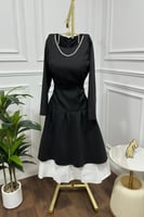 فستان اسود ميدي مزين بلؤلؤ