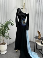 فستان سهرة انيق مزين بتطريز انيق