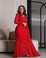 فستان احمر مميز بتطريز ورود على الاطراف