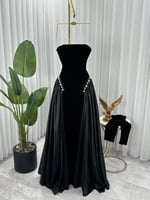 فستان اسود انيق بتصميم ملفت