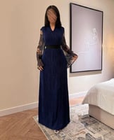 جلابية طويلة بأكمام مشجرة