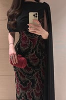 فستان سهرة مميز مزين بورود