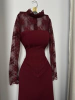 فستان اسود انيق بأكمام طويلة