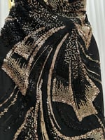 فستان سهرة اسود بتطريز ذهبي