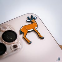 ملصق معدني غزال