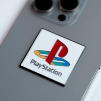 ملصق معدني بلاستيشن