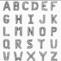 بالون الحروف الطائرة الفضي