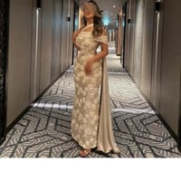 فستان سهرة بيج مطرز بتصميم أوف شولدر