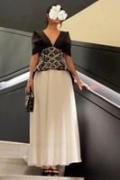 فستان سهرة أسود وأوف وايت بتصميم فاخر