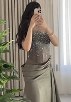 فستان سهرة زيتي مطرز بالكريستال اللامع