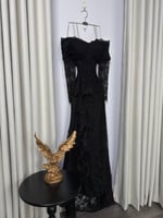 فستان أسود دانتيل بأكمام طويلة وتصميم أنيق