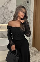 فستان سهرة أسود دانتيل بكم طويل وتنورة انسيابية