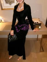 فستان أسود مخملي بتفاصيل بنفسجية فاخرة