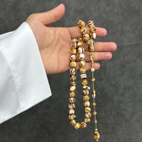 مسباح عاج مع كهرمان طبيعي كبس تمليكة