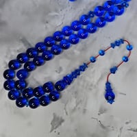 سبحة كاست ازرق شفاف تمليكة