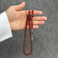 سبحه بكلايت احمر مكحل شفاف مع كركوشة