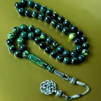 مسباح بكلايت لون اخضر مموج مع طربزونه فضه