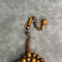 مسباح خشب عود تملكية