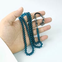 مسباح زعفراني لون اكوامارين 99 خرزة